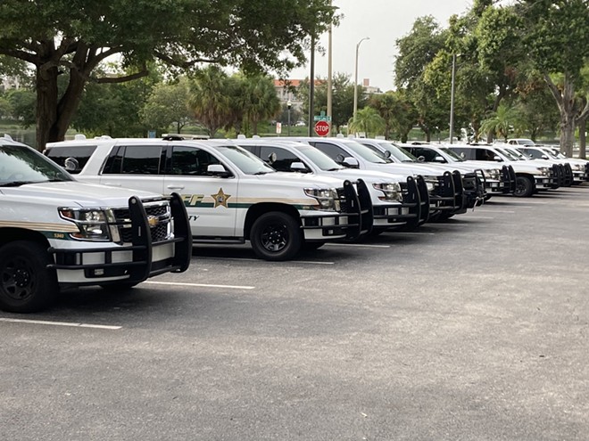 PSCO cruisers lined up near the Pinellas County Courthouse, ahead of a demonstration by housing rights advocates. - William Kilgore