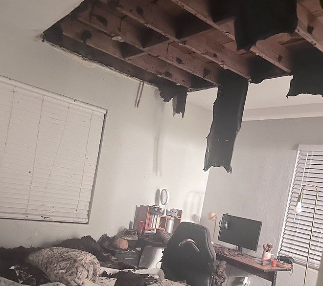 The ceiling collapsed in Wendy Castro and Mark Smalley's apartment on July 31. - Wendy Castro