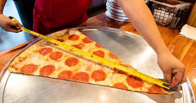Fat Boy's takes the pizza challenge to the next level with its annual two-foot slice challenge. - Fat Boy's Pizza/Facebook