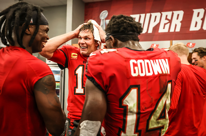 Tom Brady (center) with Julio Jones (L) and Chris Godwin (R) after the Tampa Bay Buccaneers beat the New Orleans Saints 17-16 at Raymond James Stadium in Tampa, Florida on Dec. 5, 2022. - Photo via Buccaneers