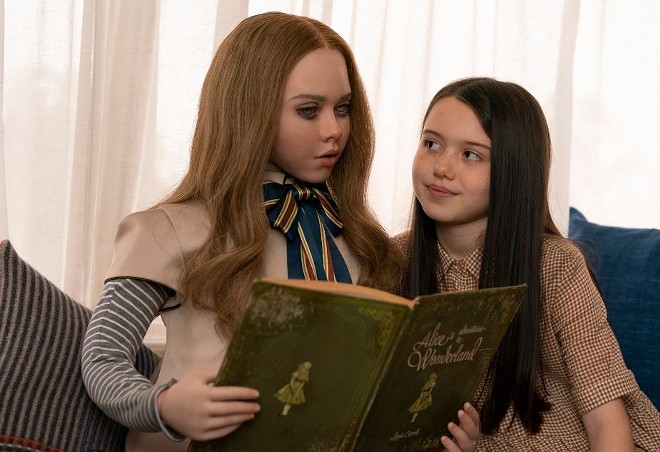 Cady (Violet McGraw), right, forms an immediate bond with M3gan, a sentient android doll that exists to protect her from any threats, whether school bullies, a vicious dog or a pesky nosy neighbor. What could go wrong? - Photo via Geoffrey Short and Universal Pictures
