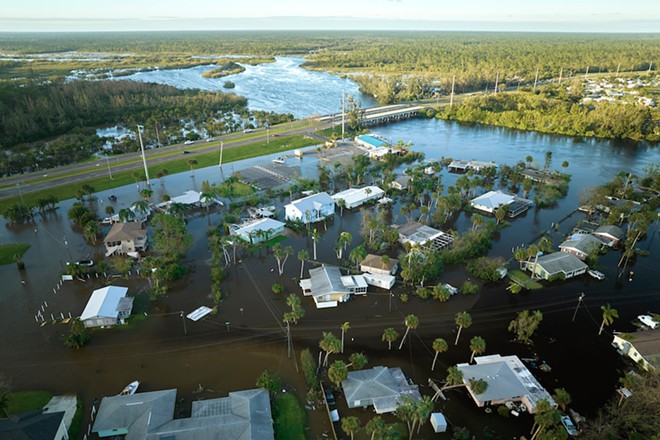 A Florida neighborhood flooded from Hurricane Ian. - Photo via Adobe