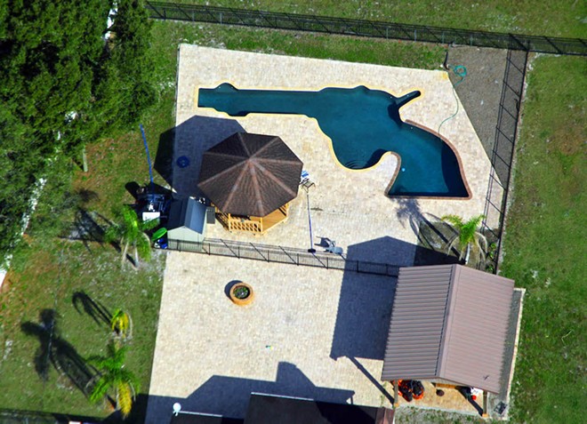 Tampa Bay man explains why he built a gun-shaped swimming pool in his backyard