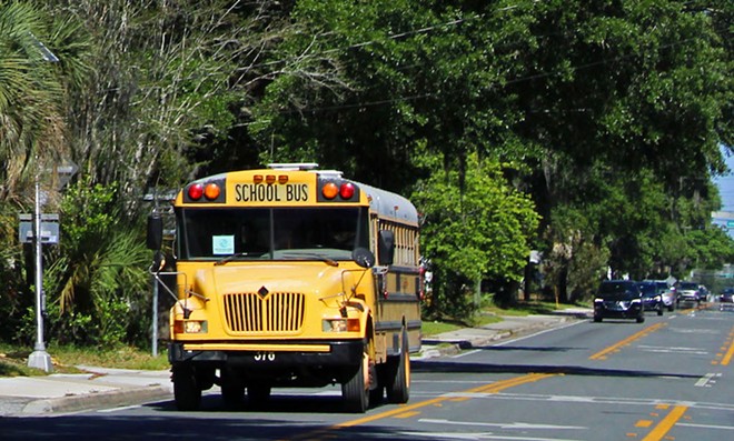 An Alachua County school bus drives in Gainesville, Florida, on April 18, 2023. Florida's Legislature is considering proposals to require later start times for all middle and high schools. - Photo by Brooke Johnson/ Fresh Take Florida