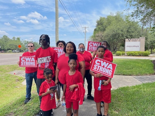 Riverview call center workers, employed by Maximus, at a rally in protest of mass layoffs, insufficient pay in May 2023 - Photo via Communications Workers of America Union