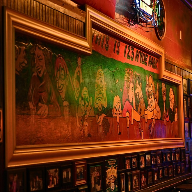 The iconic painting opposite The Retreat bartop was uncovered from wood paneling in 2008, which is when the current group of investors stepped in to breathe new life into the bar. - Photo via retreattampa/Facebook