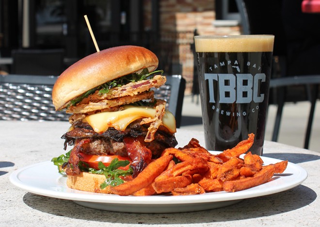 TBBC Westchase's 'The Carnivore' burger complete with a 5 oz. wagyu patty, grilled portabella mushrooms, bacon and hickory-smoked gruyere. - c/o Tampa Bay Brewing Co.