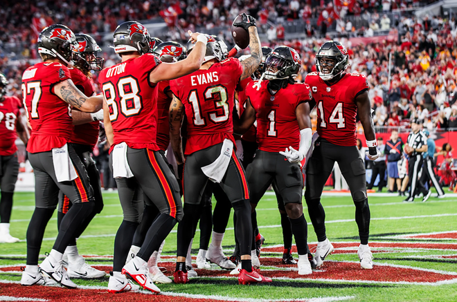 Tampa Bay Buccaneers wide receiver Mike Evans—pictured, center, on Dec. 24, 2023 at Raymond James Stadium in Tampa, Florida—hauled in a pair of touchdowns to make it 13 tuddys for the year. - Photo by Tori Richman/Tampa Bay Buccaneers