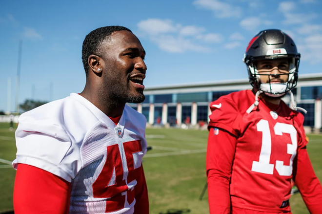 Devin White (L) and Mike Evans at the AdventHealth Training Center in Tampa, Florida on Dec. 21, 2023. - Photo by Kyle Zedaker/Tampa Bay Buccaneers