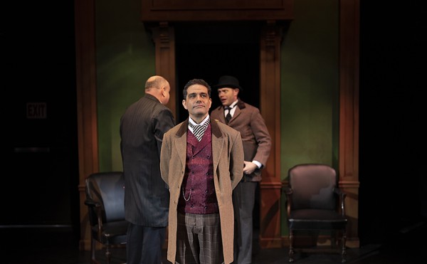 Embodying the supremely cool and cerebral Sherlock Holmes, Davis returns to the stage while also directing the madcap action with perfect panache.