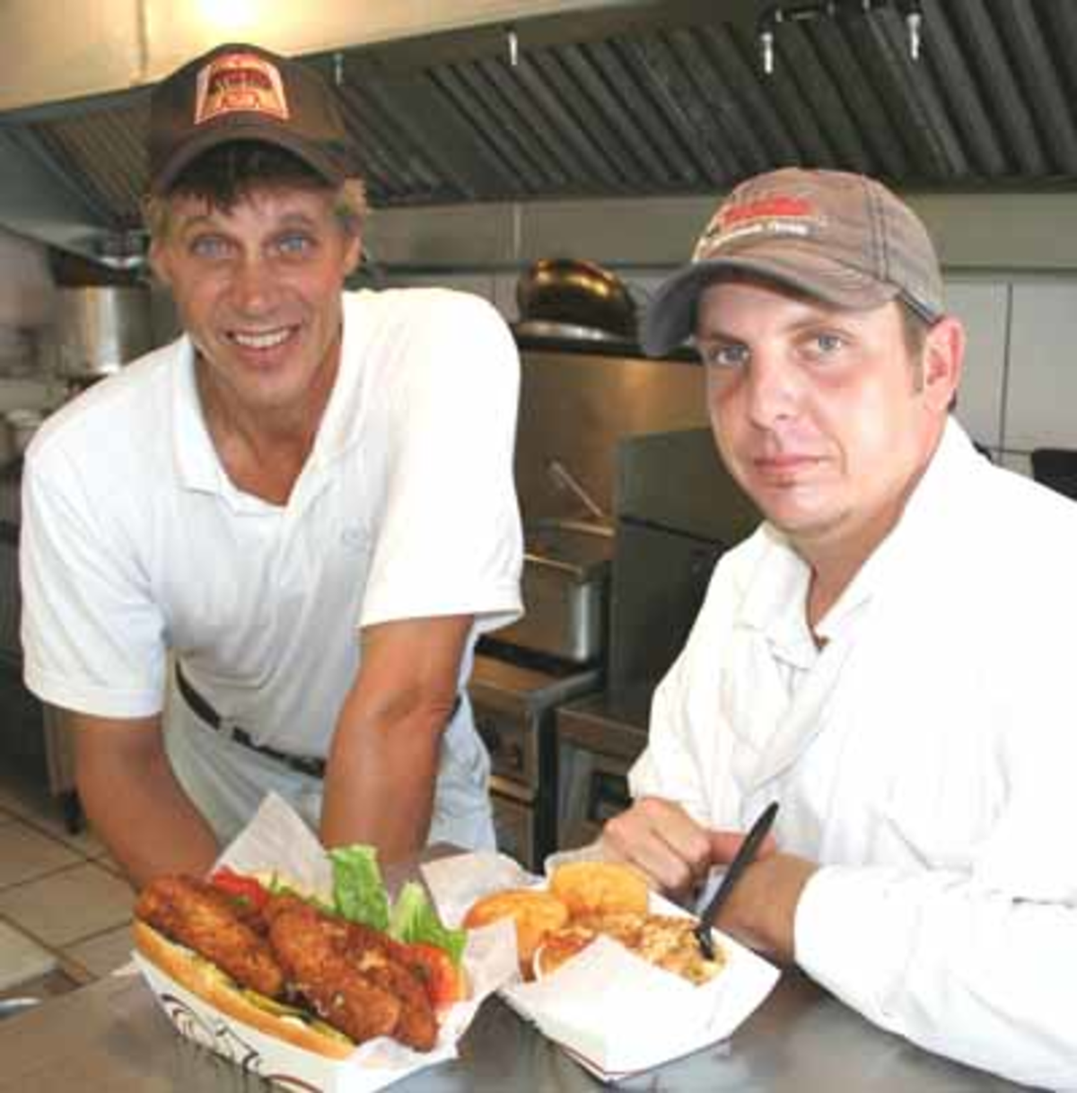 Co-owner James Walton and chef Todd Felix of Wild Shrimp Company.