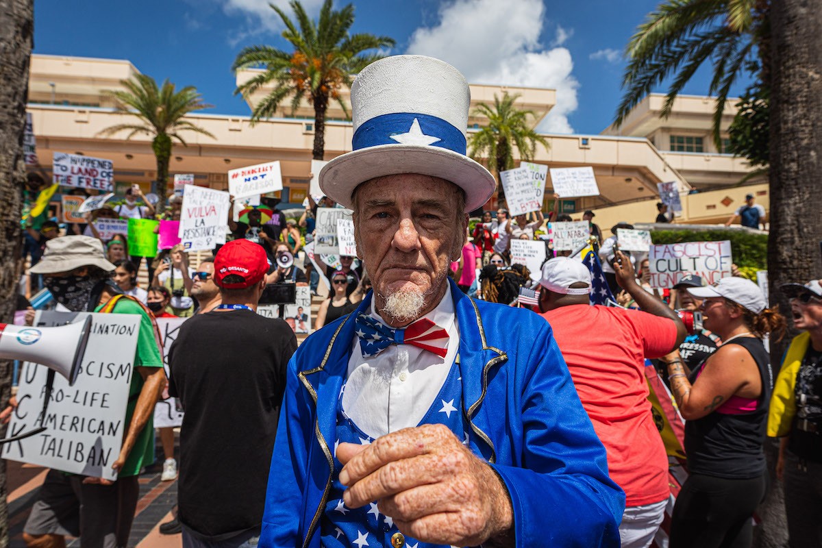 Photos: Neo-Nazis gather outside Turning Point USA summit at Tampa ...