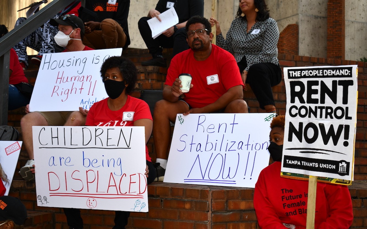 Protesters demand more protections for renters outside of Tampa City Hall in February.