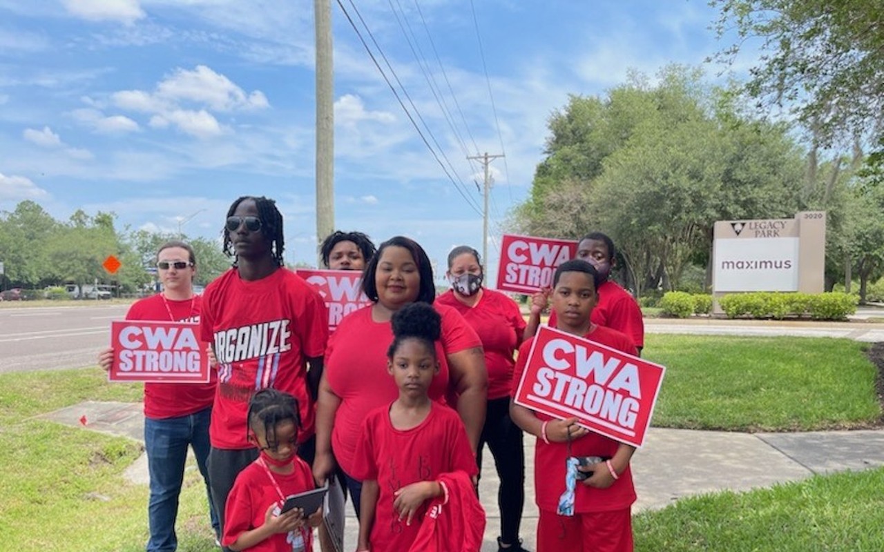Riverview call center workers, employed by Maximus, at a rally in protest of mass layoffs, insufficient pay in May 2023