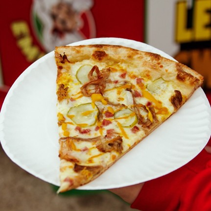 Cuban Pizza
    Pizza Emporium tops its Dijonnaise base with a mozzarella and Swiss blend &#151; plus roast pork, ham and pickles &#151; to present an oh-so-Tampa pie.