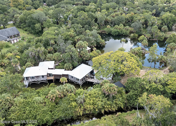 This Florida bungalow sits over a private freshwater lake