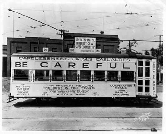 Streetcar in front of 7th Avenue barn, side view featuring safety messages and slogans in Tampa, Florida on April 19, 1927.
Photo by Burgert Brothers via Tampa-Hillsborough County Public Library System