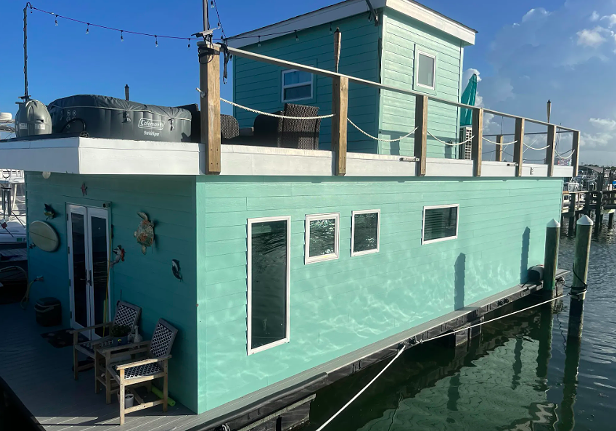 This custom-built Florida houseboat is on the market for $345K