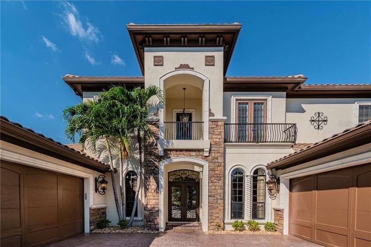 The Lutz home of former Tampa Bay Bucs tackle Chris Hovan is now on the market