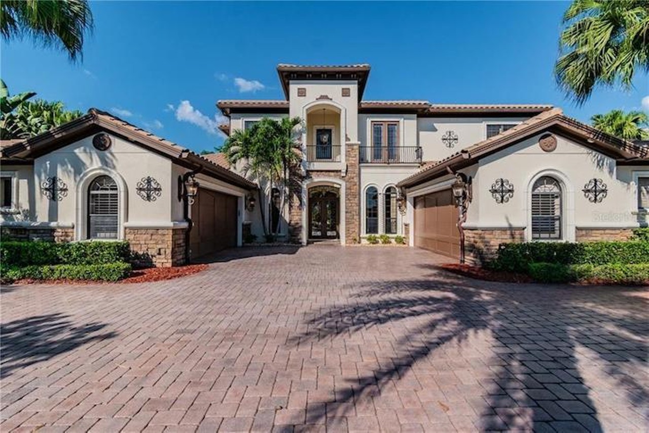 The Lutz home of former Tampa Bay Bucs tackle Chris Hovan is now on the market