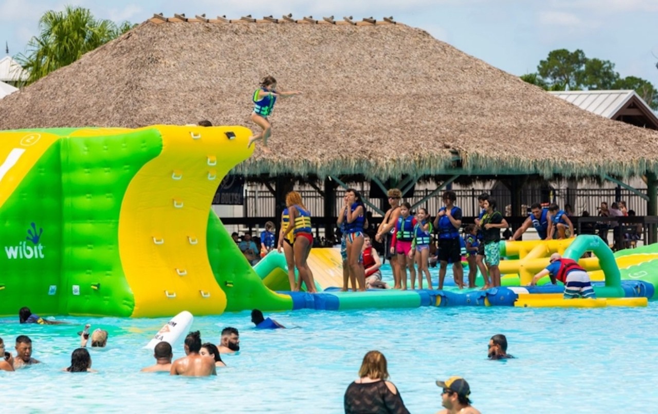 Swim in a 7-acre fake lagoon
31885 Overpass Road, Wesley Chapel. 813-444-5221
The Epperson lagoon features a 30-foot water slide, a water obstacle course, AquaBana rentals (water cabana), a waterside bar and more. Day passes cost $40 for adults and $33 for kids ages 4-12. Add-on experiences cost extra.Photo via MetroLagoons/website