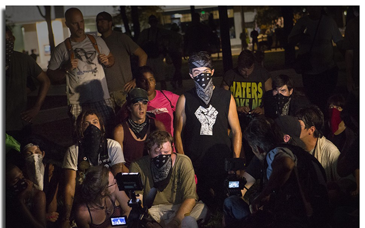 Protesters give accounts of police brutality during their demonstration in gaslight Park Wednesday night