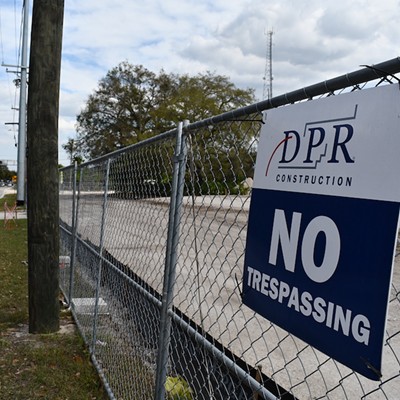 A DPR Construction sign sits on the fence surrounding the Hanna Avenue project in 2021.