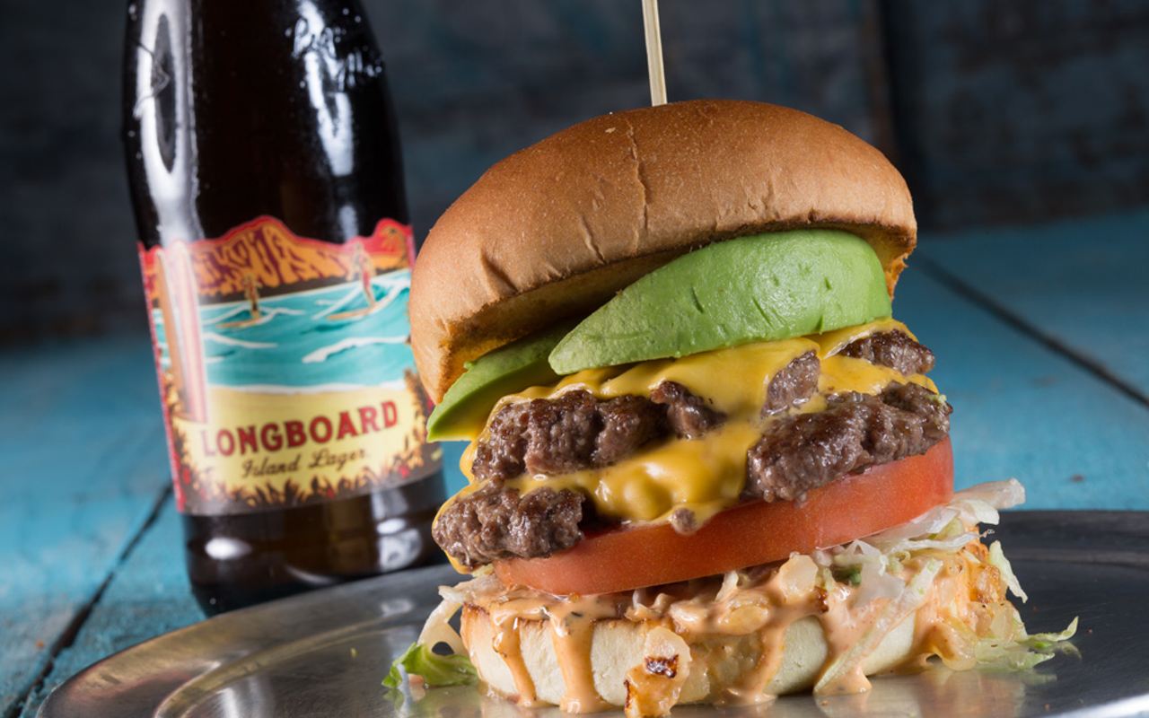 The Santa Barbara, a signature Jimmy Hula's double cheeseburger with grilled onion, avocado, lettuce, tomato and "voodoo" sauce.