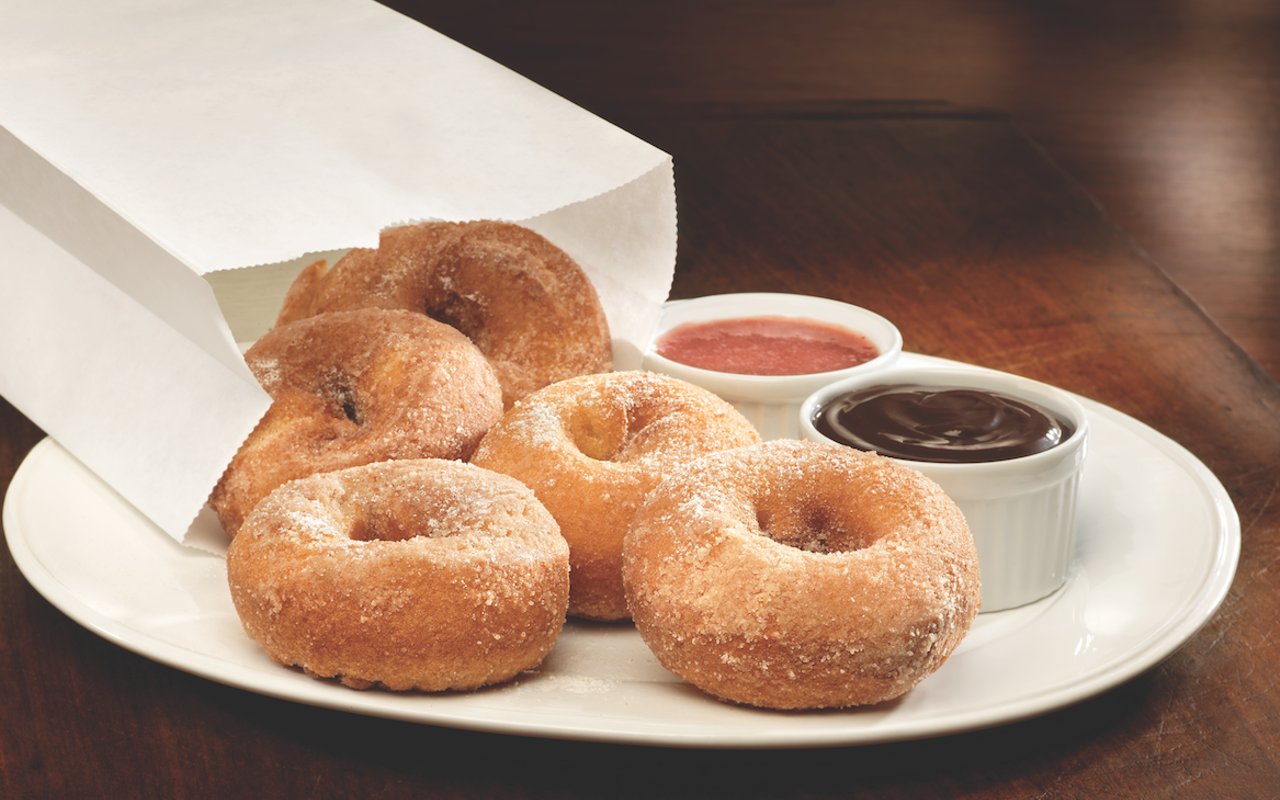 Smokey Bones' Hot Bag of Donuts with dipping sauces.