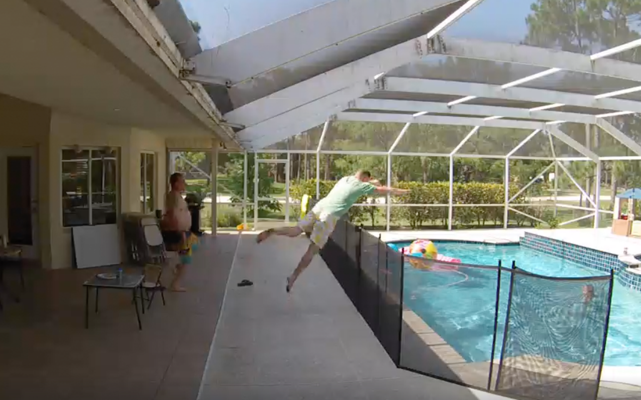 Video shows Florida dad diving over 4-foot pool fence to save drowning son