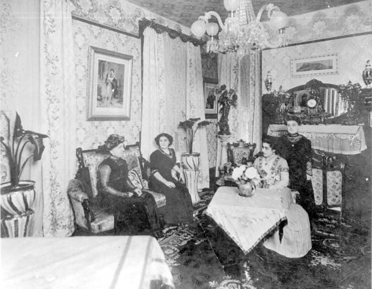 Fannie Haya and three women in parlor at 605 Magnolia Avenue, Hyde Park, 1895