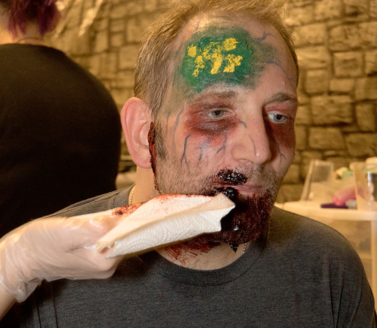 Watch our writer become a zombie for Tampa Bay's Scream-A-Geddon Halloween attraction