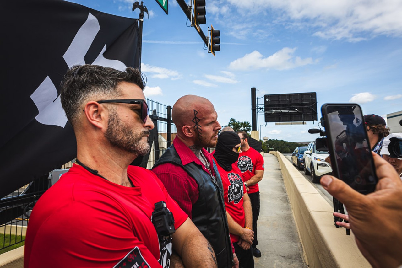 'We are everywhere': Multiple neo-Nazi groups carrying swastika and DeSantis flags march through Orlando [PHOTOS]
