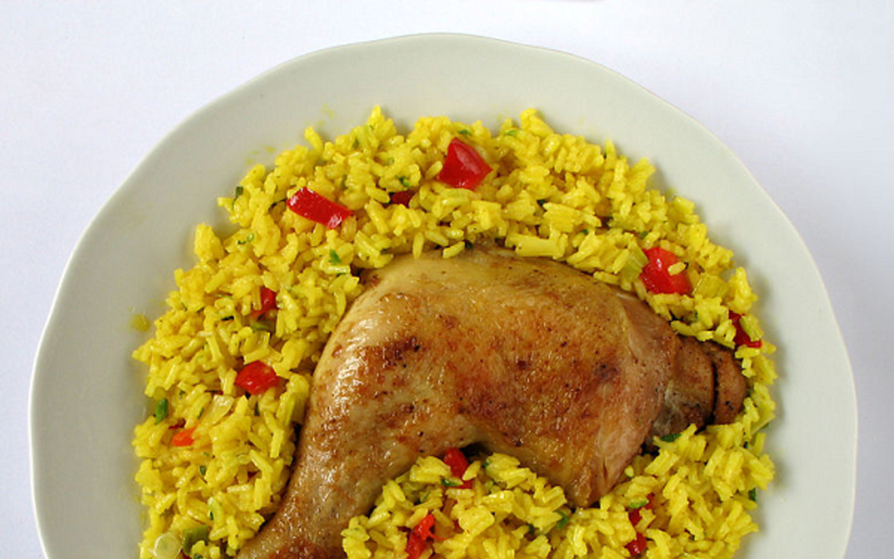 Arroz con pollo, or rice with chicken.