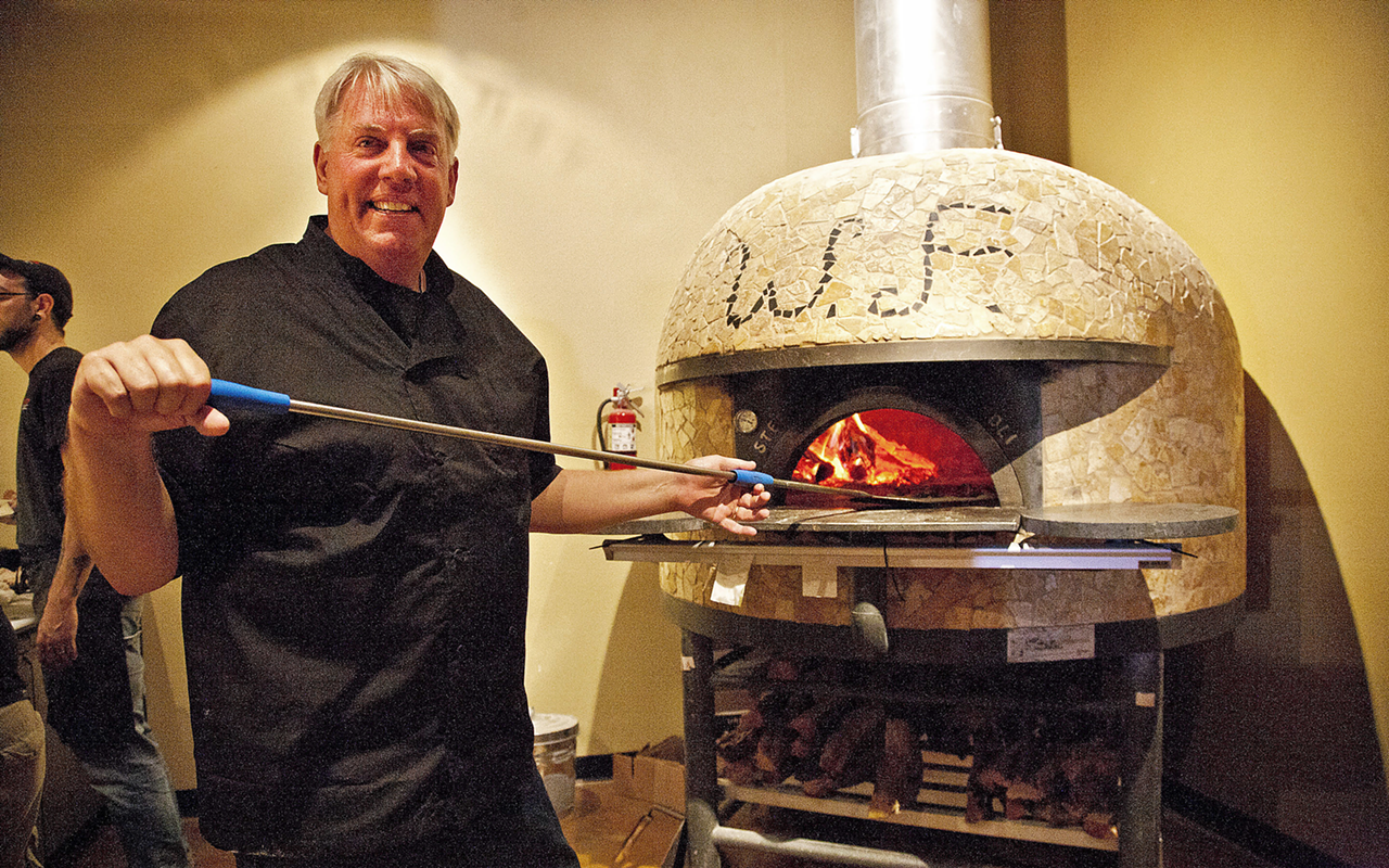 THE PEEL DEAL: Taylor mans the pizza peel at the Wood Fired oven in St. Pete.